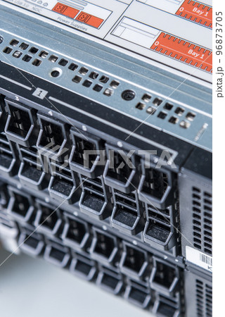 Row of hard disks used for data storage in internet data center 96873705