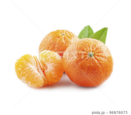 Ripe tangerine fruits with leaves with slices mandarin on white backgrounds. 96876075