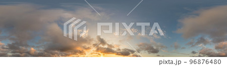 Dark blue sunset sky panorama with golden Cumulus clouds. Seamless hdr 360 panorama in spherical equirectangular format. Full zenith for 3D visualization, sky replacement for aerial drone panoramas. 96876480
