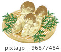 かごに置かれた新鮮な松茸とひのきの葉 96877484