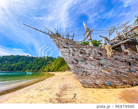 Old wooden pirate boat on the beach in Koh Phayam, Ranong, Thailand Old wooden pirate boat on the beach in Koh Phayam, Ranong, Thailand 96879980