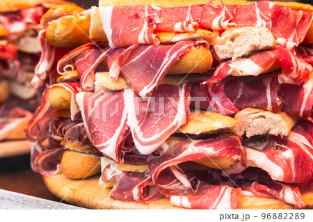 delicious salami with slices of cheese delicious salami with slices of cheese 96882289