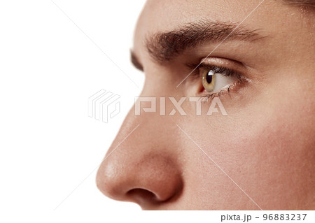 Side view portrait of young man isolated over white background. Nose, eyes. Plastic surgery. Concept of male beauty, body and skincare 96883237