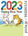 ウサギと虎のサッカーのイラスト年賀状 96886324