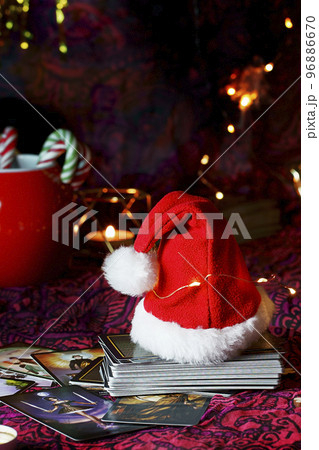 Concept of Christmas divination predictions on tarot cards and other magic 96886670