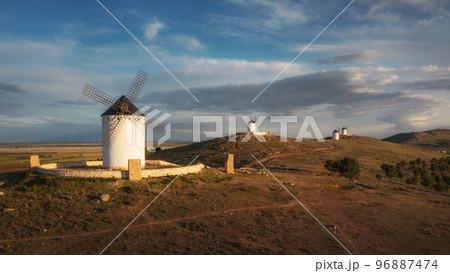 Windmills. These iconic towers over their skylines of la Mancha. Windmills. These iconic towers over their skylines of la Mancha. 96887474