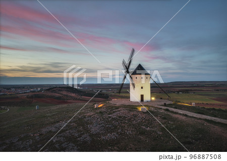 Windmills. These iconic towers over their skylines of la Mancha.  96887508