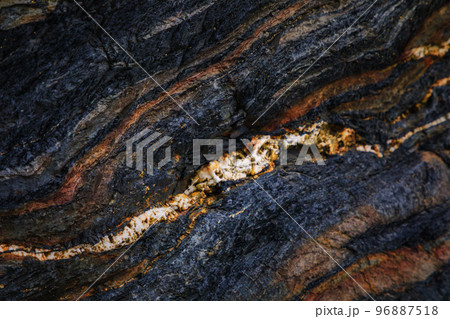 Rocky shapes on the beach. textures and patterns generated on the stones of the Asturian beaches 96887518