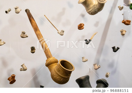 Vintage ceramic tobacco smoking pipes installation 96888151
