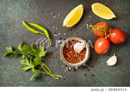 Healthy food vegetarian food background. Various herbs and spices for cooking on dark background. View from above. 96889414