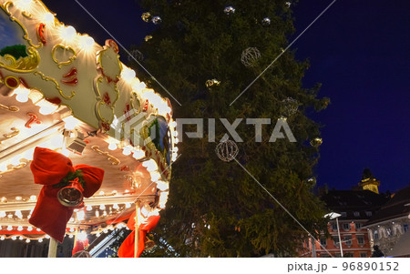 Vintage carousel and beautiful Christmas decorations at night, in the city center of Graz, Styria region, Austria 96890152