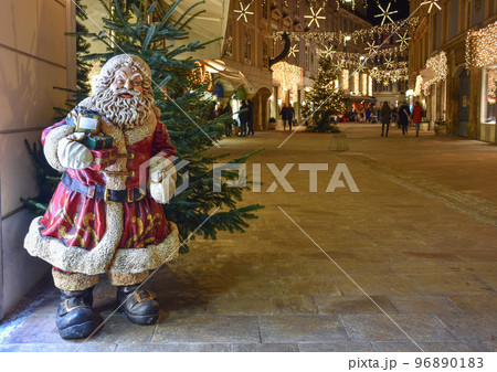 Santa Claus and beautiful Christmas decorations, at night, in the city center of Graz, Styria region, Austria 96890183