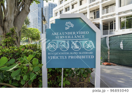 Area under video surveillance bicycles, scooters, skates, skateboard strictly prohibited sign- Miami 96893040