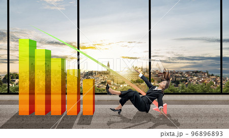 Asian businesswomen falling with decreasing graph Asian businesswomen falling with decreasing graph 96896893