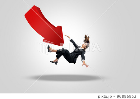 Asian businesswoman falling on down arrow 96896952