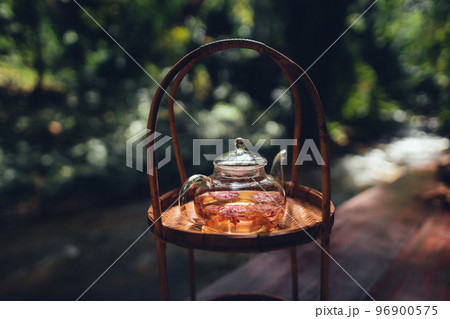 flower tea,Tea set on the terrace, natural background flower tea,Tea set on the terrace, natural background 96900575