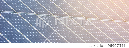 Close up of solar panels outside, alternative green energy, a renewable energy source Close up of solar panels outside, alternative green energy, a renewable energy source 96907541