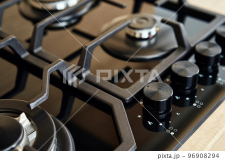 Gas stove with hob in kitchen, close up Gas stove with hob in kitchen, close up 96908294