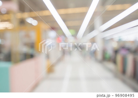Blurred image of people walking at shopping mall Blurred image of people walking at shopping mall 96908495