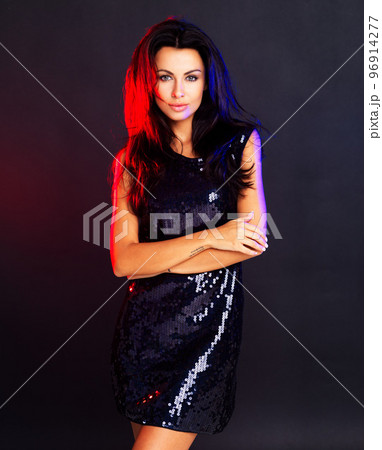 Portrait, beauty and woman dress for party, power or confident on black studio background. New year, young female and evening gown with attitude, elegant and proud lady ready for night out or glamour 96914277