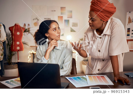 Laptop, meeting or fashion designer women in office planning, collaboration or thinking of creative color wheel. Small business, diversity or startup working for teamwork, analysis or strategy 96915343