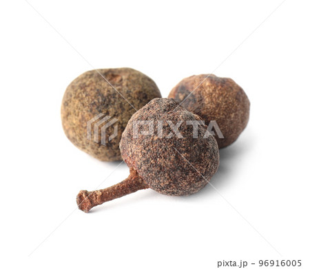 Spicy black pepper grains isolated on white Spicy black pepper grains isolated on white 96916005