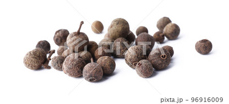 Heap of black pepper grains isolated on white Heap of black pepper grains isolated on white 96916009
