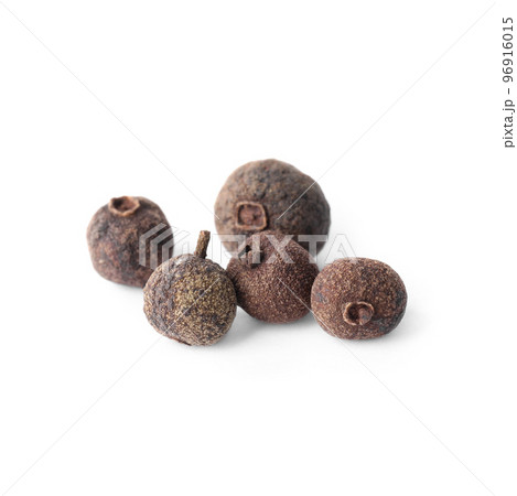 Spicy black pepper grains isolated on white 96916015