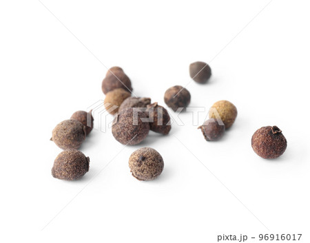 Spicy black pepper grains isolated on white Spicy black pepper grains isolated on white 96916017
