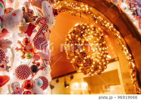 STRASBOURG, FRANCE - December 2021 - Magical Christmas decorations on historic bakery in historic city centre STRASBOURG, FRANCE - December 2021 - Magical Christmas decorations on historic bakery in historic city centre 96919066
