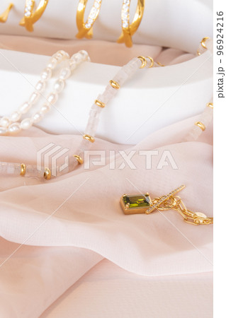 Girl jewelry accessories including earrings and necklaces on display 96924216