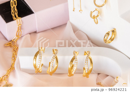 Girl jewelry accessories including earrings and necklaces on display 96924221