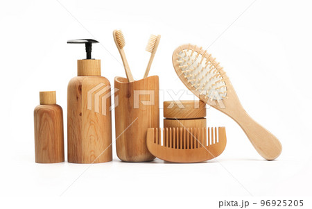 Hygiene toiletries in wooden containers on white 96925205