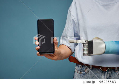 Bionic Hand Pointing at Smartphone 96925583