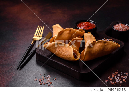 Tasty fresh pancakes with meat, sheep, spices and herbs Tasty fresh pancakes with meat, sheep, spices and herbs 96926258