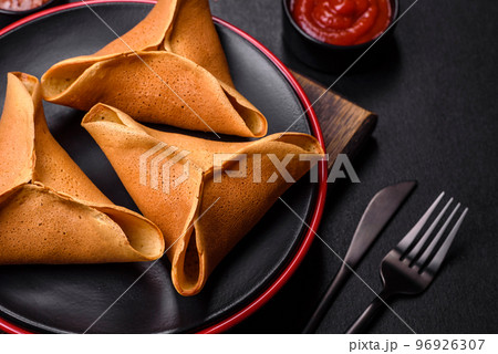 Tasty fresh pancakes with meat, sheep, spices and herbs 96926307