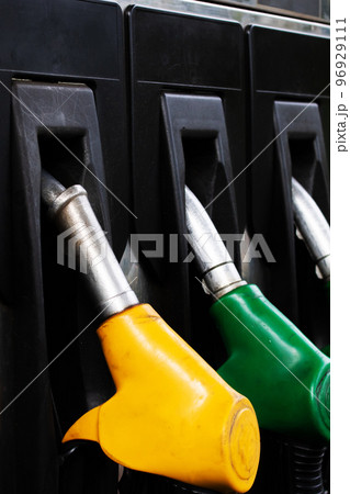 Pistols with gasoline at a gas station 96929111