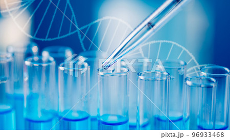 Test tubes with blue liquid water samples and pipette over blue background. Laboratory glassware, science laboratory research concept. 96933468