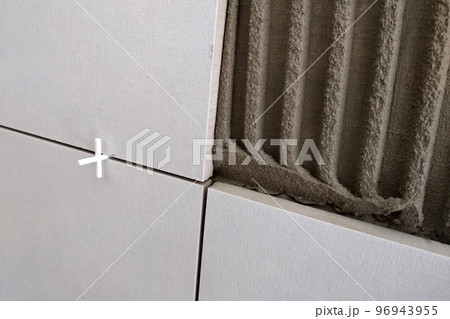 Wall ceramic tiles installation on mortar glue. Wall ceramic tiles installation on mortar glue. 96943955