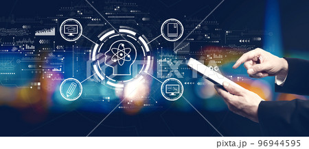 Online education concept with businessman using a tablet computer 96944595