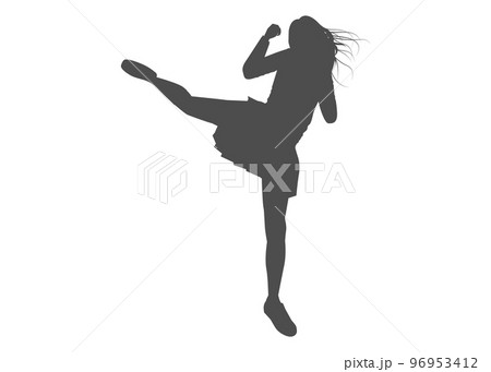 スカートでキックをしている女性の全身正面のシルエット 96953412
