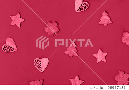 Wooden decorations on a red background. Christmas concept 96957181