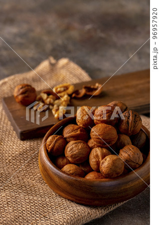 Walnuts on the table. 96957920