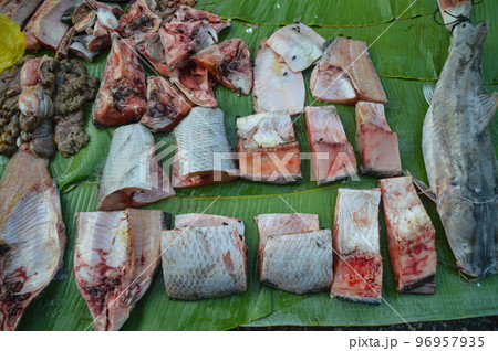 Top view of exotic freshwater fishes sold in the local market showing the authentic life and culture in Luang Prabang, Laos 96957935