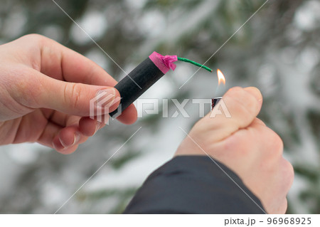 Guy Sets Fire to the Flash Noise Firecracker Outdoors Guy Sets Fire to the Flash Noise Firecracker Outdoors 96968925