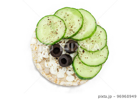Rice Cake Sandwich with Fresh Cucumber, Cottage Cheese and Olives - Isolated Rice Cake Sandwich with Fresh Cucumber, Cottage Cheese and Olives - Isolated 96968949