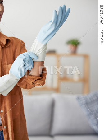 Woman hands, cleaner with gloves and cleaning, hygiene and safety against bacteria and germs, cleaning service and prepare for house work. Employee, housekeeper with spring cleaning and clean mockup. 96971088