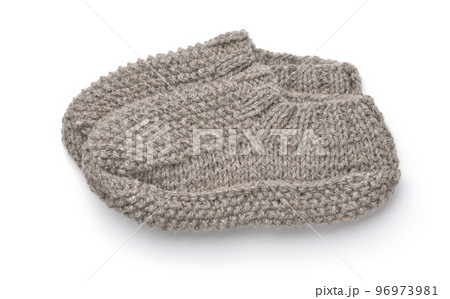 Side view of gray hand knitted wool slipper socks Side view of gray hand knitted wool slipper socks 96973981