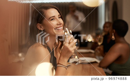 Happy, dinner party and woman with glass of champagne for special celebration event, friendship reunion or New Year. Fine dining restaurant, friends and elegant girl with alcohol drink to celebrate Happy, dinner party and woman with glass of champagne for special celebration event, friendship reunion or New Year. Fine dining restaurant, friends and elegant girl with alcohol drink to celebrate 96974888