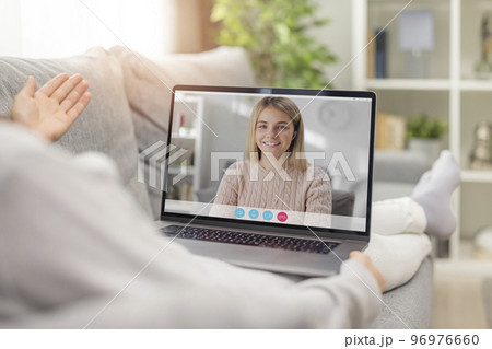 Pleasant talk using laptop 96976660